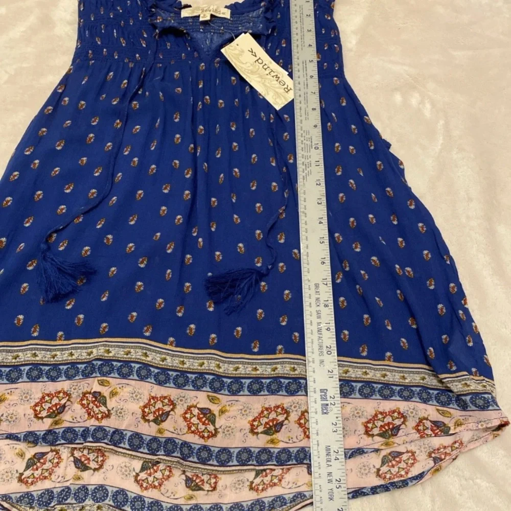 Rewind Royal Blue Sleeveless Floral Blouse with Patterned Hem